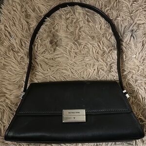 Michael Kors Black Textured Shoulder Bag with Flap Closure